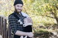 Millennial Dad with Baby in Carrier Outside Walking Royalty Free Stock Photo