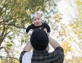 Millennial Dad Holding Baby Daughter Up Showing Affection Royalty Free Stock Photo