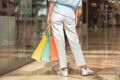 Millennial european lady in casual with many shopping bags in hand, look at shopwindow enjoy fashion Royalty Free Stock Photo