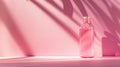 Millennial pink background featuring a stylish reusable water bottle with abundant copyspace Royalty Free Stock Photo