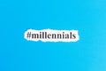 Millennials text on paper. Word Millennials on torn paper. Concept Image