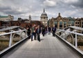 Millennium Bridge. Background is St Paul's cathedral in London Royalty Free Stock Photo