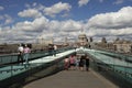 The Millennium Bridge in London with St. Paul`s Cathedral view on a summer day