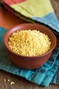 Millet in bowl Royalty Free Stock Photo