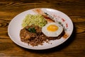 Millet porridge with meat, chopped eggs