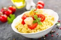 Millet porridge with tomatoes and cheese Royalty Free Stock Photo