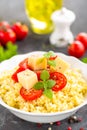 Millet porridge with tomatoes and cheese Royalty Free Stock Photo