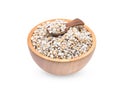 Millet rice , millet grains in wooden bowl and spoon isolated on Royalty Free Stock Photo