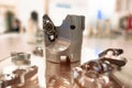 Milling cutters with mechanical fastening of many-sided cutting inserts. Shallow depth