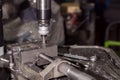 Milling details on a metal-cutting machine. production at a small enterprise