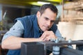 milling machine operator working in factory workshop Royalty Free Stock Photo