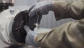 Close up hands of milling machine operator working in factory workshop. Turning lathe machine in turning workshop Royalty Free Stock Photo