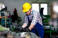 The milling-machine operator works at the lathe. Royalty Free Stock Photo