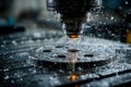 A milling machine precisely cuts into a metal component, showcasing automation and precision engineering with coolant spraying to Royalty Free Stock Photo