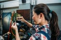 Milling machine worker verify manufacturing steel Royalty Free Stock Photo