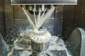 Milling metalworking process. Industrial CNC metal machining by vertical mill Royalty Free Stock Photo