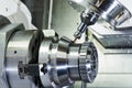 Milling metalworking process. Industrial CNC metal machining by vertical mill.