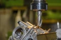 The milling process on NC milling machine with motorcycle cylinder head parts