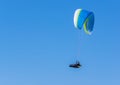 Lone Paraglider in mid air