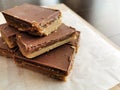 Millionaire`s shortbread with chocolate and caramel. Royalty Free Stock Photo