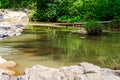 Millpond, stones and trees