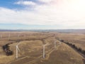 Mills, generators, windmills, power plant from a height in the field. Green energy Royalty Free Stock Photo