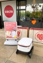 Milton Keynes, UK - 2nd October 2021: Coffee delivery robot waiting for an order outside a city centre Costa outlet.