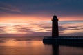 Red lighthouse at sun rise on Lake Michigan in Milwaukee Royalty Free Stock Photo