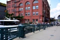 Tourists lining up for Milwaukee River and Harbor Cruise