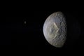 Mimas satellite, Saturn`s moon, orbiting in the outer space. 3d render