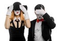 Mime actors are hiding eyes Royalty Free Stock Photo