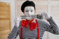 Mime artist with duct tape, parody comedy