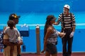 Mime artist interacting with people entering the show at Seaworld.