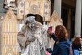 Mime artist performing in medieval clothes in the streets of Florence, Italy