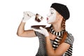 Mime comedian drinking coffee