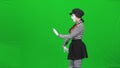 Mime girl walking the moonwalk beyond the screen. Chroma key.