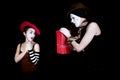 Mime gives gift with red box