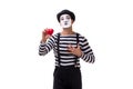 The mime holding red heart isolated on white background Royalty Free Stock Photo
