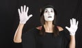 Female Clown Mime Looks Up in White Face Royalty Free Stock Photo