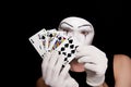 Mime with royal flush on a black background Royalty Free Stock Photo