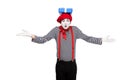 mime showing shrug gesture with gift box on head