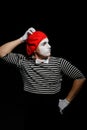 Mime thinking and touching head Royalty Free Stock Photo