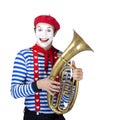 Mime with trombone.Emotional funny actor wearing