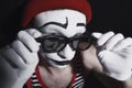 Mime wearing red hat and eyeglasses Royalty Free Stock Photo