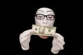 Mime in white gloves with 10 dollar denomination Royalty Free Stock Photo