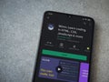 Mimo - Learning coding app play store page on the display of a black mobile smartphone on ceramic stone background