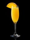 Mimosa cocktail garnished with an orange slice isolated on black Royalty Free Stock Photo