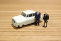 the min figures of people and car Royalty Free Stock Photo