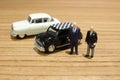 the min figures of people and car Royalty Free Stock Photo