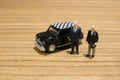 the min figures of people and car Royalty Free Stock Photo